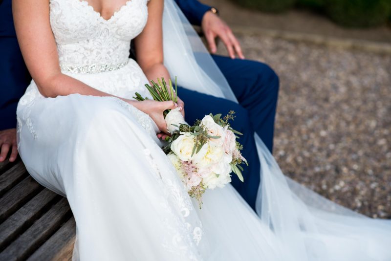 bride holding flowers